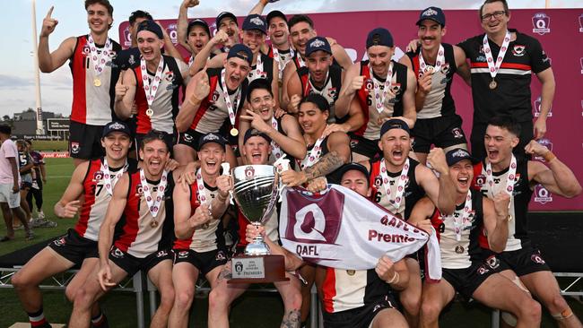 Morningside celebrates its premiership in the 2024 QAFL grand final between Morningside and Redland Victoria Point. Picture: Highflyer Images.