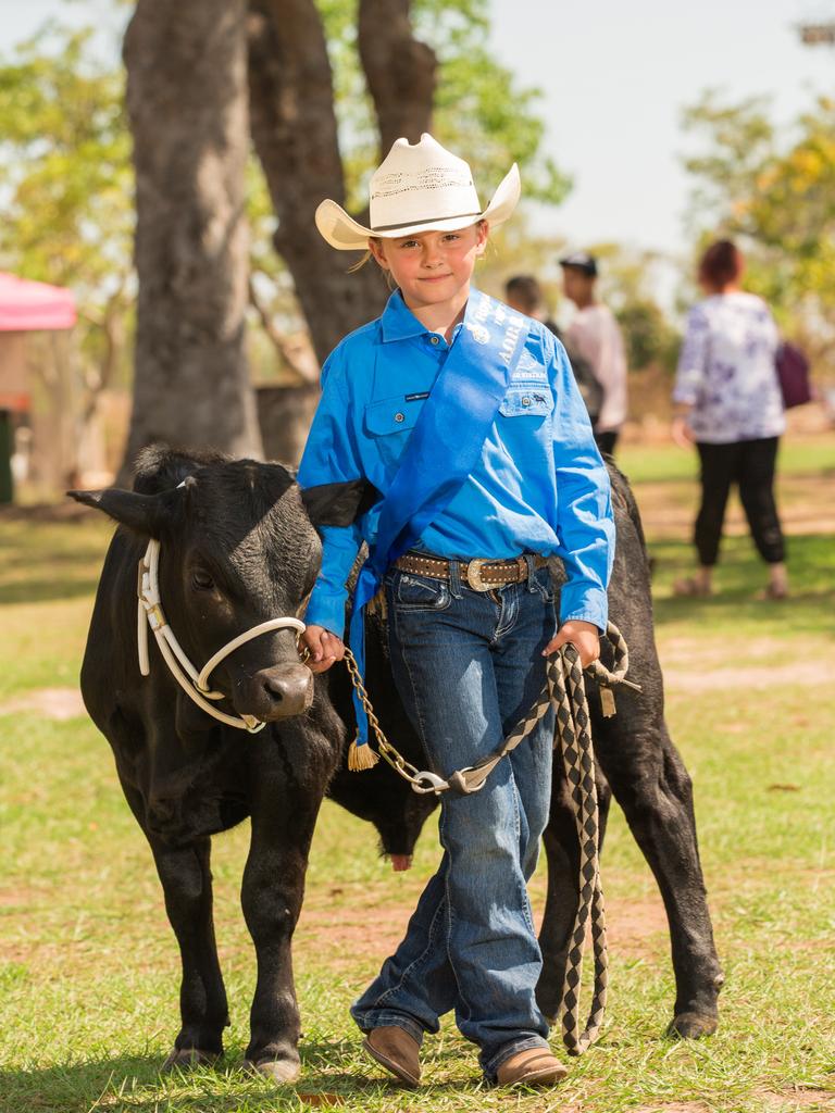 Nellie Rammage, 7, with Kuzco, her Lone Liner Miniature cross, takes out the U/14 handlers award at the Show. Picture GLENN CAMPBELL