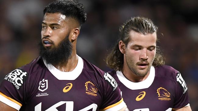 Broncos teammates Payne Haas and Pat Carrigan will be on opposite sides on Wednesday night.