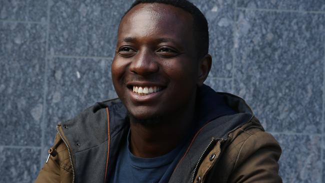 QLD_QWEEKEND_HARDKNOCKS Feature on how uni scholarships have changed lives. Ezekiel Nimbaye fled Burundi as a five year old without any family, grew up in a refugee camp, came to Australia in 2009, won a QUT scholarship and is now in his final year of a Bachelor of Engineering degree. Photo David Kelly