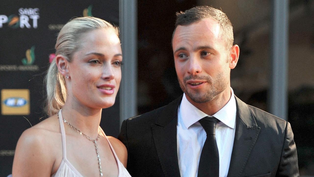 Oscar Pistorius and Reeva Steenkamp. (Photo by LUCKY NXUMALO / AFP)