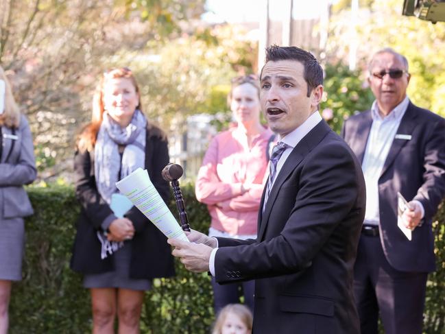 Auctioneer Vic Lorusso auctions 7 Ferguson St, Forestville for First National Realestate Frenches Forrest. The property sold for just over $1.8 million on 8th July 2017. (AAP image/Ryan Osland)