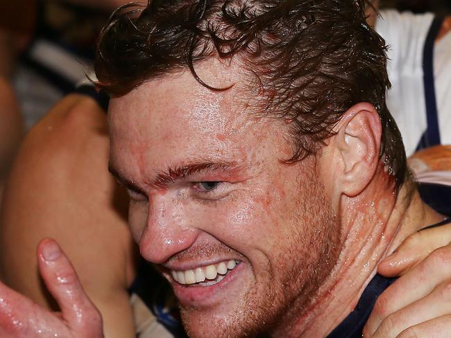 MELBOURNE, AUSTRALIA - JUNE 14: Colin Sylvia of the Dockers celebrates his first win with the club during the round 13 AFL match between the Richmond Tigers and the Fremantle Dockers at Melbourne Cricket Ground on June 14, 2014 in Melbourne, Australia. (Photo by Michael Dodge/Getty Images)