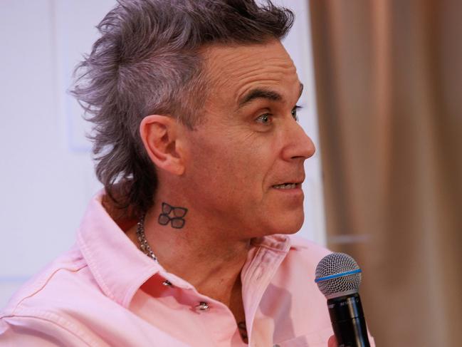 Robbie Williams played ball with the confronting line of questioning. Picture: Justin Lloyd.