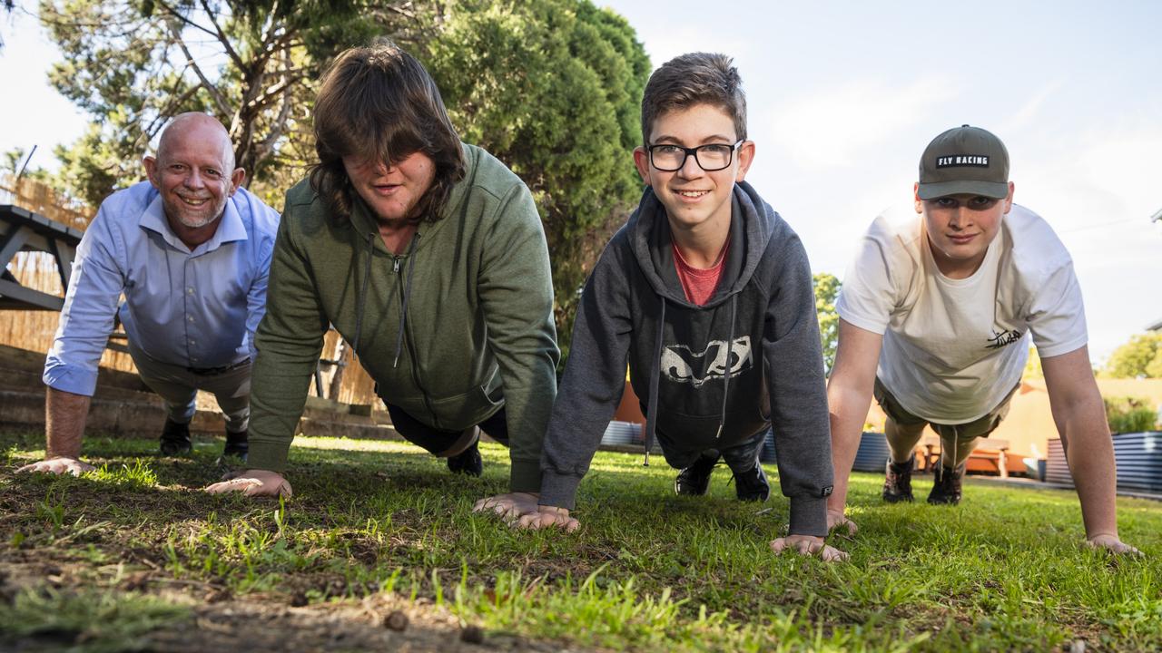 Ready for the National Push-Up Challenge are (from left) Toowoomba Flexi School staff Julian Booth and students Lane Ellis, Jackson Tipple and Brodie Butlin at the Toowoomba launch to fundraise for Lifeline Darling Downs and South West Queensland. Picture: Kevin Farmer