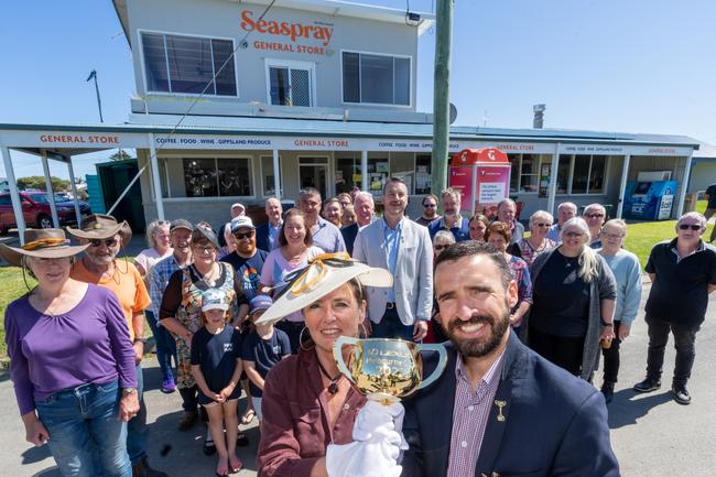 Seaspray, Victoria locals gather to view the Cup and meet Melbourne Cup-winning jockey Michael Rodd outside the General Store. Picture Jay Town