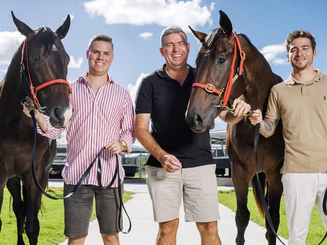 Sunshine Coast trainer Stuart Kendrick with his two sons Nathan and Bayley and brother horses Defiant Spirit and Defiant Boom who are running in the 2yo and 3yo $500,000 races on Saturday. Picture Lachie Millard