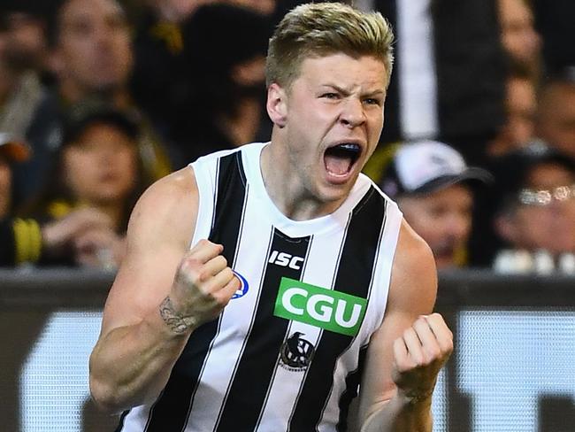 MELBOURNE, AUSTRALIA - SEPTEMBER 21:  Jordan De Goey of the Magpies celebrates kicking a goal during the AFL Preliminary Final match between the Richmond Tigers and the Collingwood Magpies on September 21, 2018 in Melbourne, Australia.  (Photo by Quinn Rooney/Getty Images)