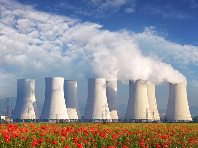 Nuclear Power plant with red field and blue sky