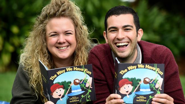 Stacey Bennett and Luke Scicluna with their book <i>The Way We Have Fun</i>. Picture: Kylie Else