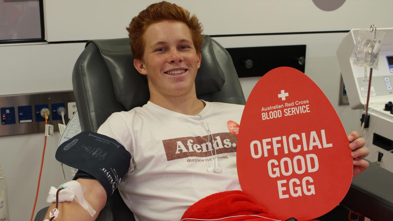 Max Cridland donating blood for Red Cross.