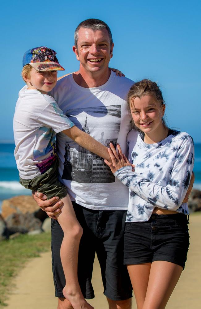 Israel Smith with his son Rilien, 7, and daughter Indrani, 11.