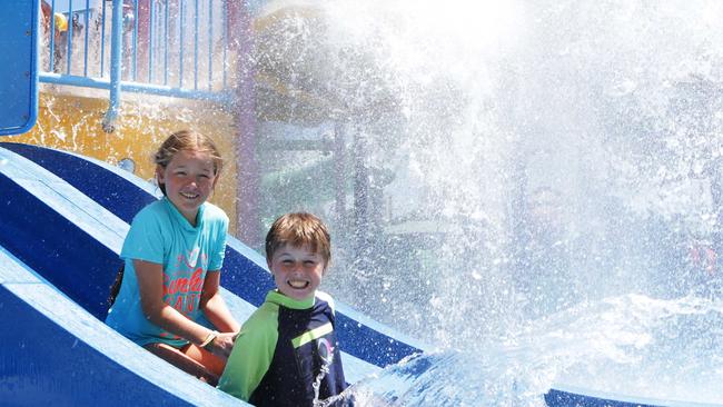 Liam Hopkins, 11, and Bianca Hopkins, 10, from Forest Lake in Brisbane enjoy the water park at the Paradise Resort in Surfers Paradise. Pic Tim Marsden