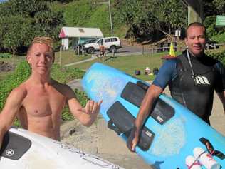 DETERMINED: Will Brighton and Todd Ives in Yamba during their 60km paddle from Woody Head to Wooli. Picture: Contributed