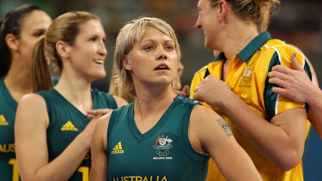 Erin Phillips #4 with her Opals teammate after defeating Belarus in the preliminary women's basketball game at the Beijing Olympic Games in 2008 in Beijing, China. Picture: Mark Dadswell