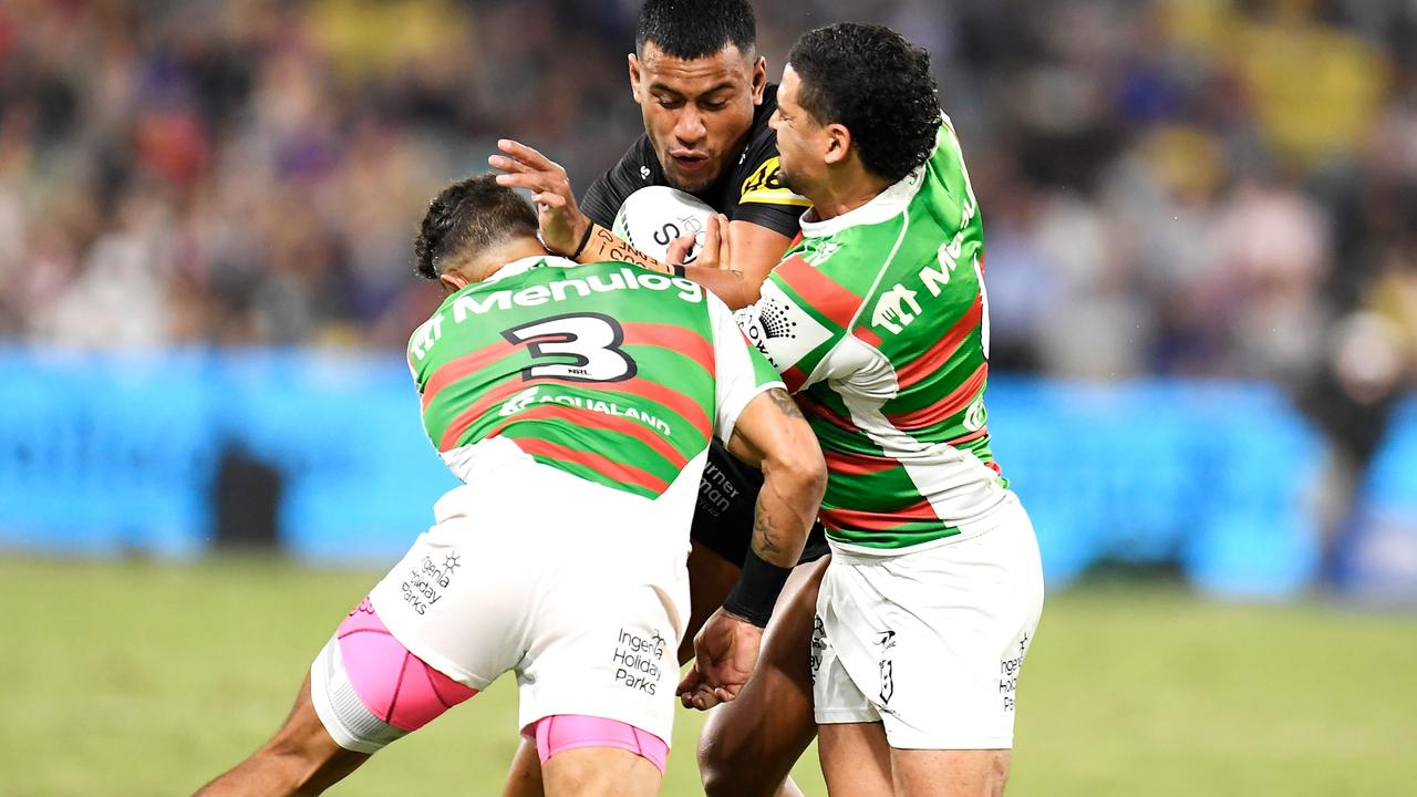 TOWNSVILLE, AUSTRALIA - SEPTEMBER 11: Stephen Crichton of the Panthers is tackled by Dane Gagai and Cody Walker of the Rabbitohs during the NRL Qualifying Final match between Penrith Panthers and South Sydney Rabbitohs at QCB Stadium, on September 11, 2021, in Townsville, Australia. (Photo by Ian Hitchcock/Getty Images)