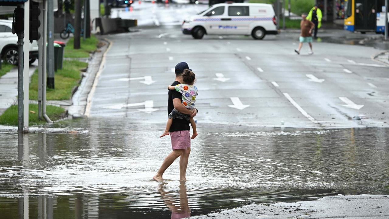 1/122024: Flash flooding in Thompson Estate reserve and on the corner of Juliette St and Earle St, rapidly flooded, in Stones Corner, Brisbane. pic: Lyndon Mechielsen/Courier Mail