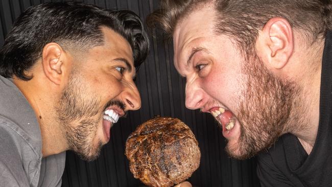 Ms Jackson Restaurant and Bar’s manager Francesco D'alterio and head chef Conor Baird enjoying the ritual of having a steak with a mate. Picture: Tony Gough