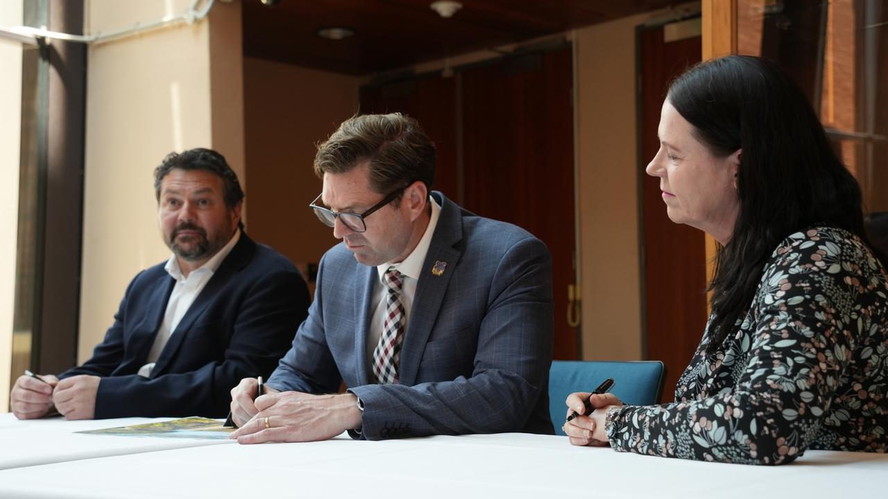 At the contract signing between the Toowoomba Regional Council, Seymour Whyte and SMEC Australia for the Cressbrook Dam safety upgrade project are (from left) Seymour Whyte COO Steve Lambert, mayor Geoff McDonald and SMEC acting chief executive Kate Drews.