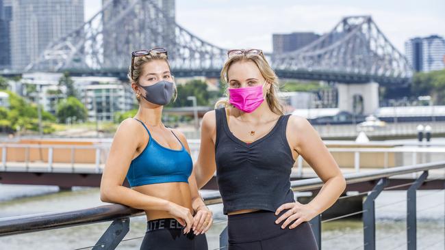 Mina Coetser and Inge Peter from New Farm at Riverwalk New Farm Park during three day COVID-19 lockdown of Brisbane, Monday, January 11, 2021. Picture: Richard Walker