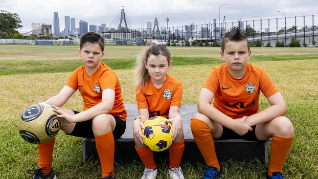 Members of the Balmain Football Association, Jonah Youngman, 10, Coco Hall 6 and Jude Youngman 8.