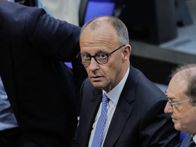 Friedrich Merz, 2nd right, reacts after he was not elected new Chancellor in the first voting process at the parliament Bundestag in Berlin, Tuesday, May 6, 2025.(AP Photo/Ebrahim Noroozi)