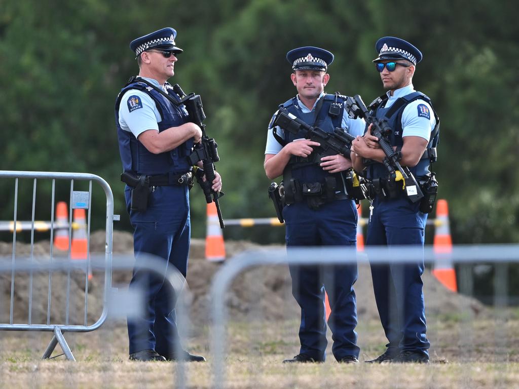 Armed Police patrol the burial ground. Picture: AFP