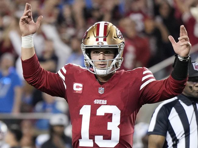 SANTA CLARA, CALIFORNIA - JANUARY 28: Brock Purdy #13 of the San Francisco 49ers reacts after a touchdown during the fourth quarter against the Detroit Lions in the NFC Championship Game at Levi's Stadium on January 28, 2024 in Santa Clara, California. (Photo by Thearon W. Henderson/Getty Images)