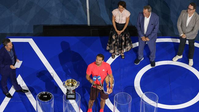 Zverev took a moment to compose himself and let the crowd noise die down before speaking.. (Photo by Adrian DENNIS / AFP)