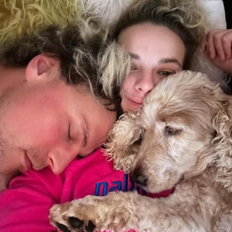 Abbie Chatfield, Konrad Bień-Stephen and their beloved Marco, who they had to put down on Friday. Picture: Instagram/abbiechatifeld