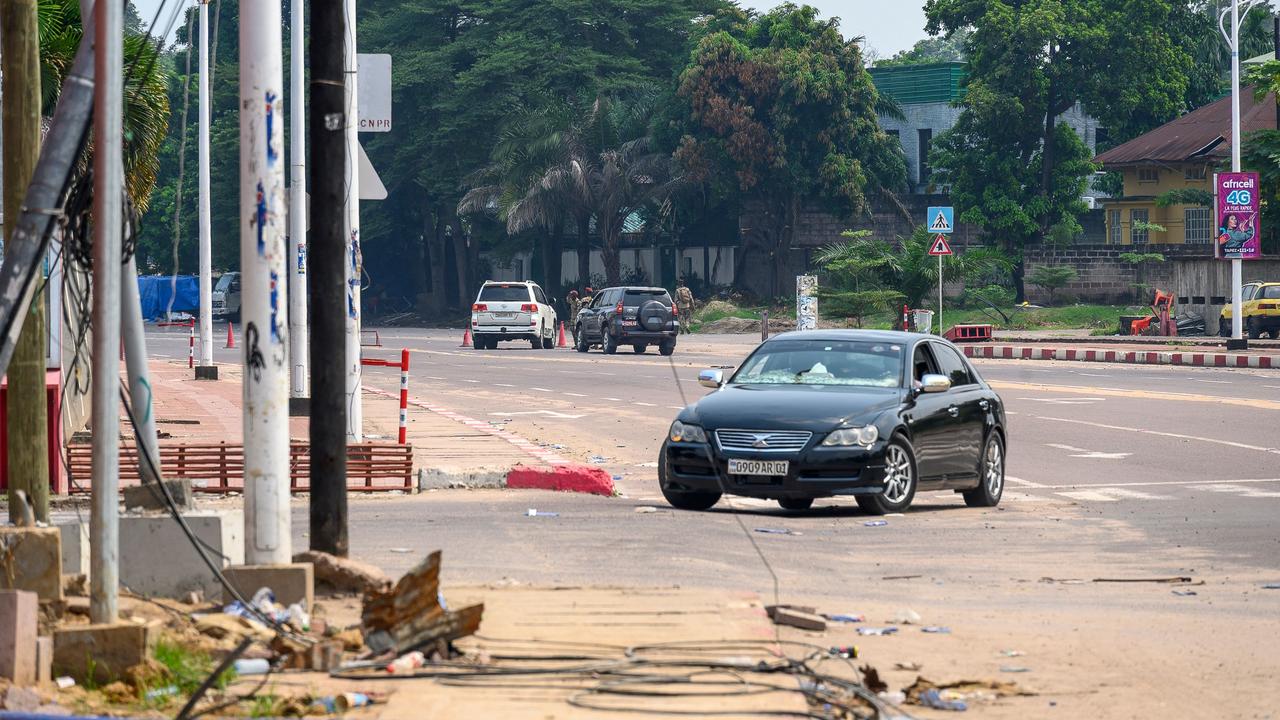 The Congolese Republican Guard diverts traffic from the scene of an attempted Coup in Kinshasa on May 19, 2024. Picture: Arsene Mpiana / AFP