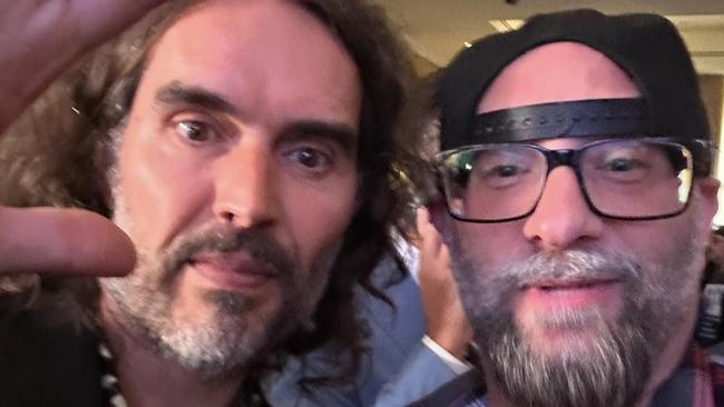 Vem Miller has been  identified as 49-year-old Las Vegas resident who was caught and arrested at a checkpoint about a quarter-mile from the Trump rally in  Coachella, Calif. Vem Miller with Russell Brand in social media post