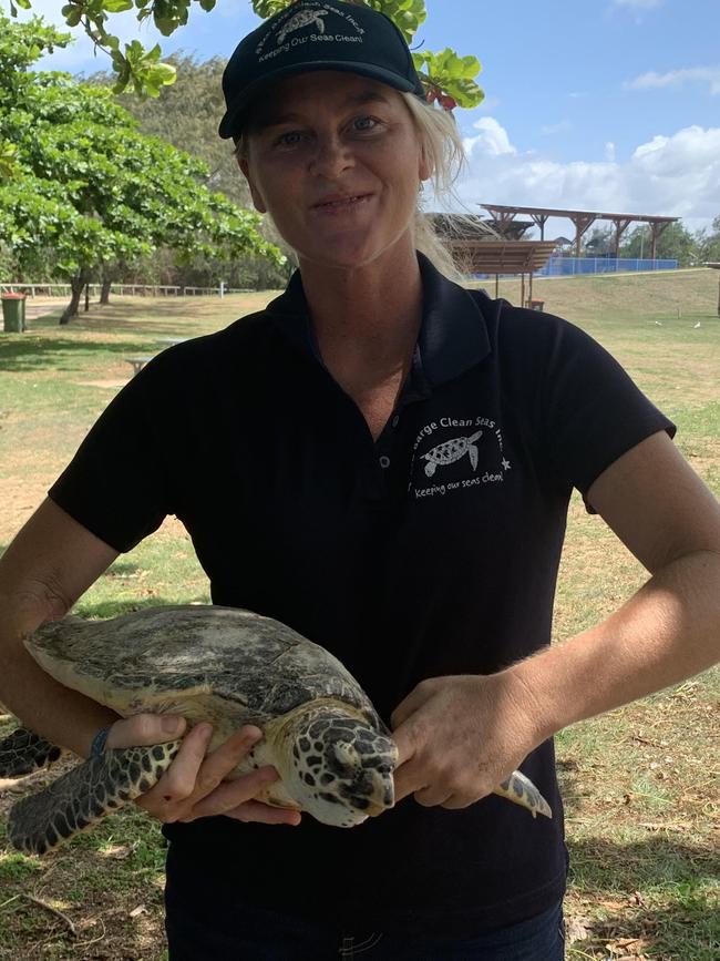 Eco Barge Clean Seas founding chair Libby Edge holding Donatella the turtle. Picture: Melanie Whiting