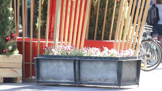 Planter boxes form temporary barriers at the eastern end of Rundle Mall. Concrete bollards are on the way.