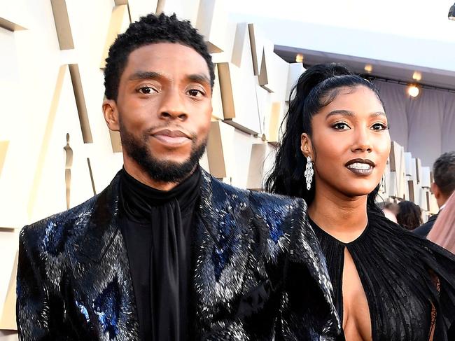 (FILES) In this file photo Chadwick Boseman and Taylor Simone Ledward attend the 91st Annual Academy Awards at Hollywood and Highland on February 24, 2019 in Hollywood. - Chadwick Boseman, the star of the ground-breaking superhero movie "Black Panther," has died from colon cancer, his publicist told AFP August 28. Boseman, who was in his 40s, had not publicly discussed his condition -- which was first diagnosed in 2016 -- and continued to work on major Hollywood films. (Photo by KEVORK DJANSEZIAN / GETTY IMAGES NORTH AMERICA / AFP)