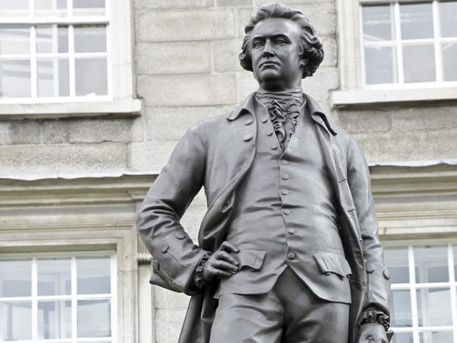 "Bronze statue (1868) of Edmund Burke (1729-1797), Irish politician (Whig) and philosopher by John Henry Foley (1818-1874), outside the main entrance of Trinity College, Dublin, Republic of Ireland." Istock