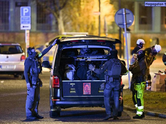 Police at the Risbergska School in Orebro after the horror gun rampage. Picture: AFP