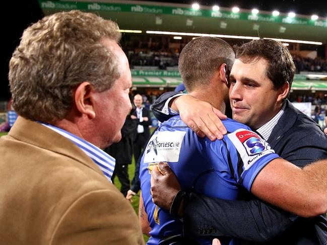 PERTH, AUSTRALIA - JULY 15:  David Wessels, head coach of the Force embraces Matt Hodgson after winning the round 17 Super Rugby match between the Force and the Waratahs at nib Stadium on July 15, 2017 in Perth, Australia.  (Photo by Paul Kane/Getty Images)