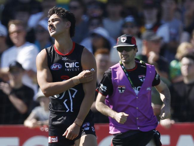 Mitch Owens of the Saints grabs at his left shoulder. Picture: Michael Klein