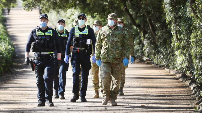 Police and ADF patrol Melbourne’s Royal Botanic Gardens. Monday, August 10, 2020. Picture: David Crosling