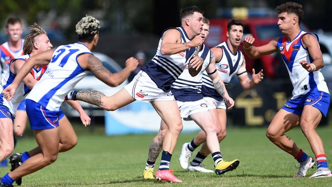 Kain Proctor wins the clearance for Bundoora. Picture: Steve Tanner