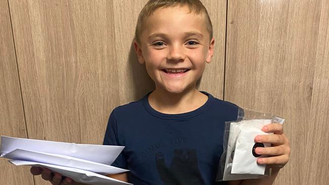 Eight-year-old Largs Bay lad Max about to send out his first jewellery orders. Picture: Supplied