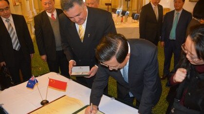 Huang Xiangmo (green tie) with a delegation of Communist Party leaders from Jiangxi Province at Victorian Parliament in 2015.