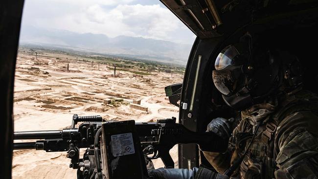 A British Royal Air Force Puma flies over the countryside of Afghanistan on its way to HKIA (Hamid Karzai International Airport) from Bagram Airfield. Picture: MOD UK