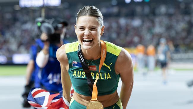 Pole vaulter Nina Kennedy celebrates gold at the world championships, where she broke her Australian record. Picture: Getty Images