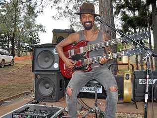 ROCK ON: Burleigh bottle slide performer Jackson 'El Mariachi' Dunn opened the show at the Kalpowar Festival of small halls. Picture: Mackenzie Colahan