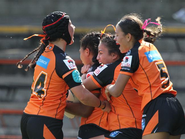 The Wests Tigers girls celebrate a try. Picture: Warren Gannon Photography