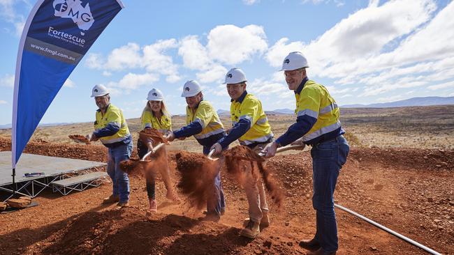 Fortescue Metals CEO Elizabeth Gaines, second left, and chairman Andrew Forrest, centre, at the Eliwana iron ore mine in Western Australia. Picture: Fortescue Metals