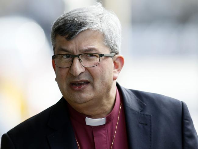 The Archbishop of Perth, Roger Herft, returns to appear as a witness during afternoon session at the Child abuse Royal Commission at Newcastle Court, Friday August 11, 2016. The public hearing will inquire into the experiences of survivors of child sexual abuse perpetrated by clergy and lay people involved in or associated with the Anglican Diocese of Newcastle. (AAP Image/Darren Pateman) NO ARCHIVING