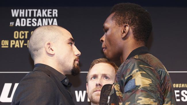 Robert Whittaker (L) and Israel Adesanya face off. Picture: Daniel Pockett/Getty